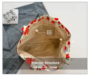 Top view of floral tote bag interior showing the main pocket and phone compartment