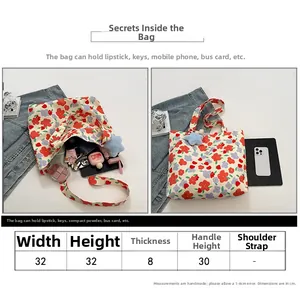 Size guide for floral canvas tote bag showing dimensions 32x32x8cm and interior capacity