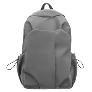 Sac à dos d'ordinateur en toile gris foncé minimaliste avec poches latérales à cordon