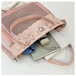 Pink ita bag tote with clear mesh window showing tablet and daily essentials storage