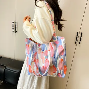 Large capacity floral canvas tote bag with colorful tulip print for stylish women shopping