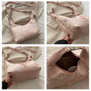 Detailed views of pink lace shoulder bag featuring 3D mesh butterfly and leather trim