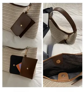 Detail view of woven tote bag showing magnetic closure, leather strap and hanging pouch