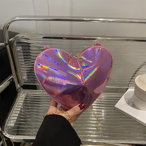 Holographic pink heart-shaped crossbody bag with gold chain strap for women