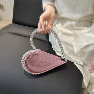 Funkelnde rosa herzförmige Abendtasche mit Kristall-Strasssteinen und rundem Griff