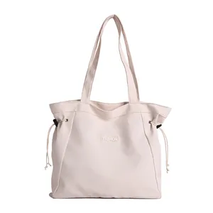 Grand sac fourre-tout blanc cassé minimaliste avec cordons latéraux et étiquette Fashion