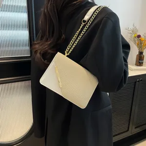 Women's chic beige woven and white PU leather crossbody bag with gold chain strap