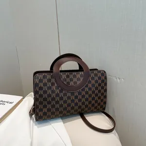 Brown monogram small square handbag with circular handle and detachable shoulder strap