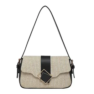 Elegant woven crossbody bag for women with leather trim and gold geometric buckle clasp