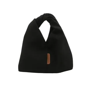 Grand sac fourre-tout à nœud en velours côtelé noir avec étiquette latérale