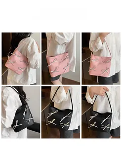 Detailed model shots of high-capacity tote bags with decorative bows and sleek shoulder straps