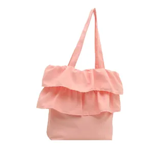 Chic light pink ruffled tote bag with multi-layer design for women's spring fashion