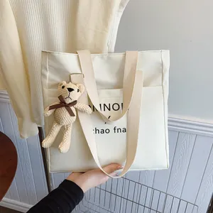 Vintage 2025 trendy white tote bag with letter print and cute knitted bear charm