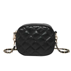 Classic black quilted crossbody bag with gold chain strap and elegant stitching