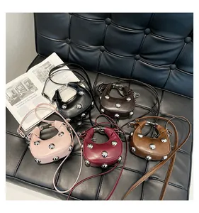 Detailed collection of mini half-moon bags with silver studs in five trendy colors