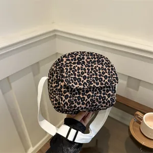 Mini leopard print crossbody bag with adjustable canvas strap for daily casual wear