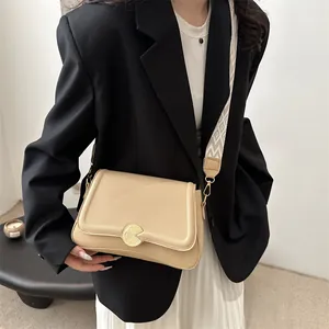 French style beige lychee texture shoulder bag with wide geometric pattern strap