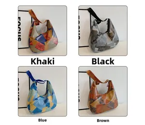 Grandi borse hobo in kaki, nero, blu e marrone con un elegante design a blocchi di colore