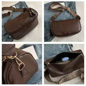 Detail view of coffee brown faux leather bag with ethnic style woven shoulder strap