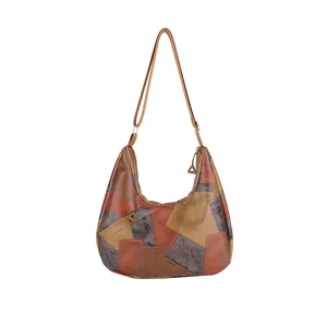 Grande borsa tote vintage in pelle patchwork con tracolla regolabile e chiusura a zip