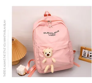 Sac à dos d'école rose avec pendentif ours en peluche et fermeture éclair à double sens