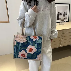 Large capacity tote bag with 3D floral embroidery and stylish fabric top handles