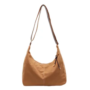 Retro canvas hobo tote bag in brown with adjustable leather strap for women