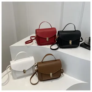 Detailansicht der Vintage-PU-Ledertaschen in den Farben Rot, Schwarz, Weiß und Braun