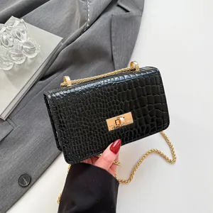 Fashionable black patent leather crossbody box bag with crocodile pattern and gold chain