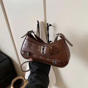 Retro brown PU leather underarm bag with decorative silver buckles and punk style straps