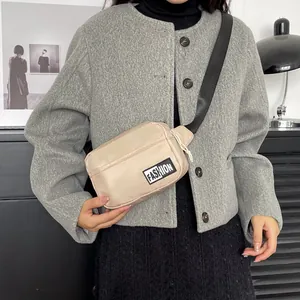Beige quilted nylon crossbody bag with black adjustable strap and fashion label