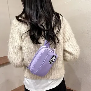 Minimalist light purple nylon crossbody chest bag with adjustable black strap for casual wear