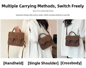 Braune Vintage-Tasche im Hand-, Schulter- und Crossbody-Stil präsentiert