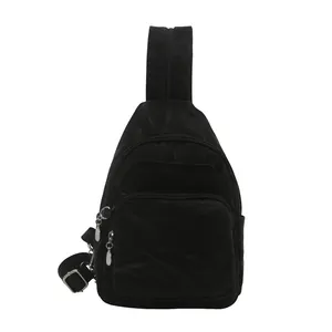 Minimalist black lightweight crossbody chest bag with adjustable strap and triple zippers