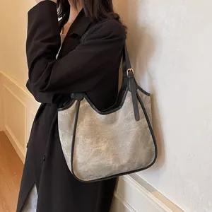Grand sac cabas vintage avec texture grise et garniture en cuir noir pour femmes