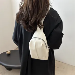 Minimalist cream white PU leather crossbody chest bag for women in casual street style