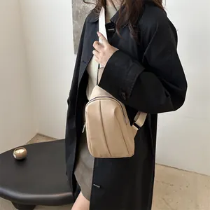 Minimalist beige crossbody chest bag with pleated leather design for women's daily commute