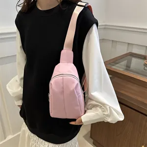 Chic pink nylon crossbody chest bag for women with adjustable strap in casual daily style
