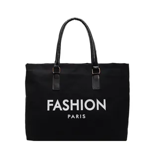 Bolso tote grande de lona negra con estampado Fashion Paris y asas de piel sintética