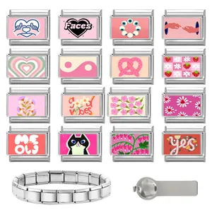 Macro view of modular pink Italian charm bracelet with enamel hearts and stainless steel link