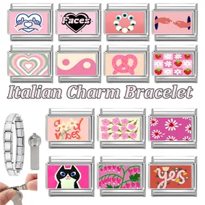 Macro detail of pink Italian charm bracelet modules with heart and floral DIY designs