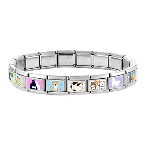 Detailed close-up of DIY Italian charm bracelet modules with cute cartoon pet designs