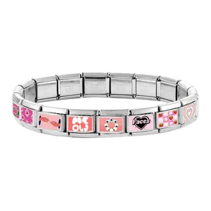 Detail view of Italian modular charm bracelet featuring pink heart and flower links