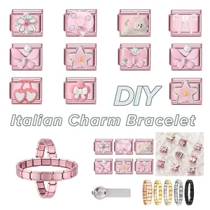 Detailed view of pink Italian modular charm bracelet links with cherry and butterfly icons