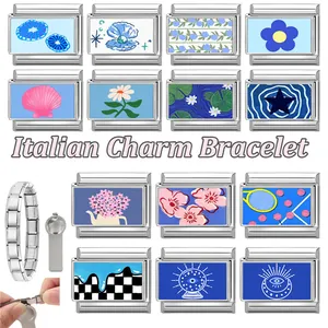 Macro view of modular Italian charms and DIY stainless steel link bracelet parts