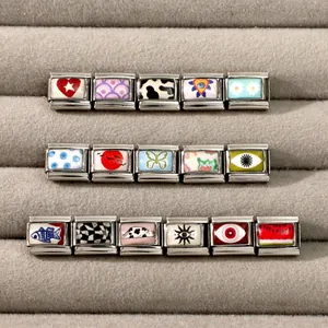 Detailed assortment of Italian charm links with enamel eye, floral and butterfly motifs