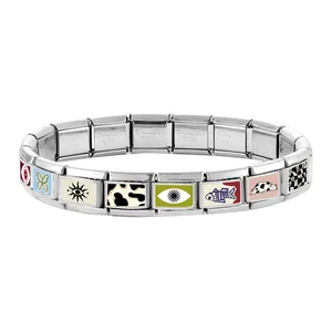 Detail of Italian style stainless steel modular bracelet with enamel butterfly and eye charms