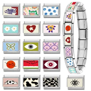 Italian modular stainless steel charm bracelet with heart, eye, and butterfly motifs