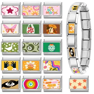 Bracciale componibile in acciaio inossidabile con charms italiani e vari motivi d'arte