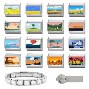 Macro view of modular Italian charm links in stainless steel with nature landscape designs